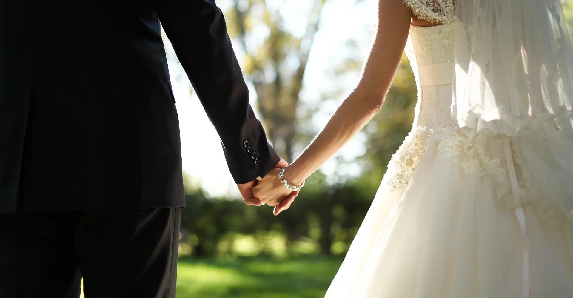 newly weds holding hands